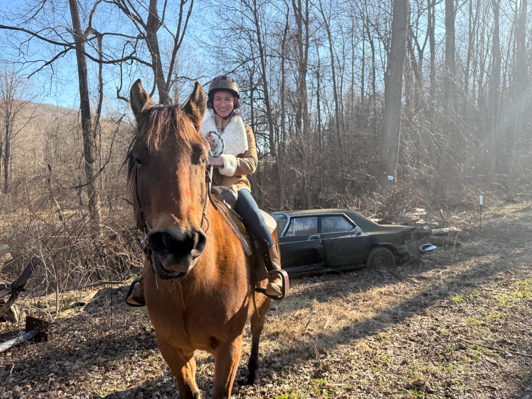 Instructor on horseback on the trail