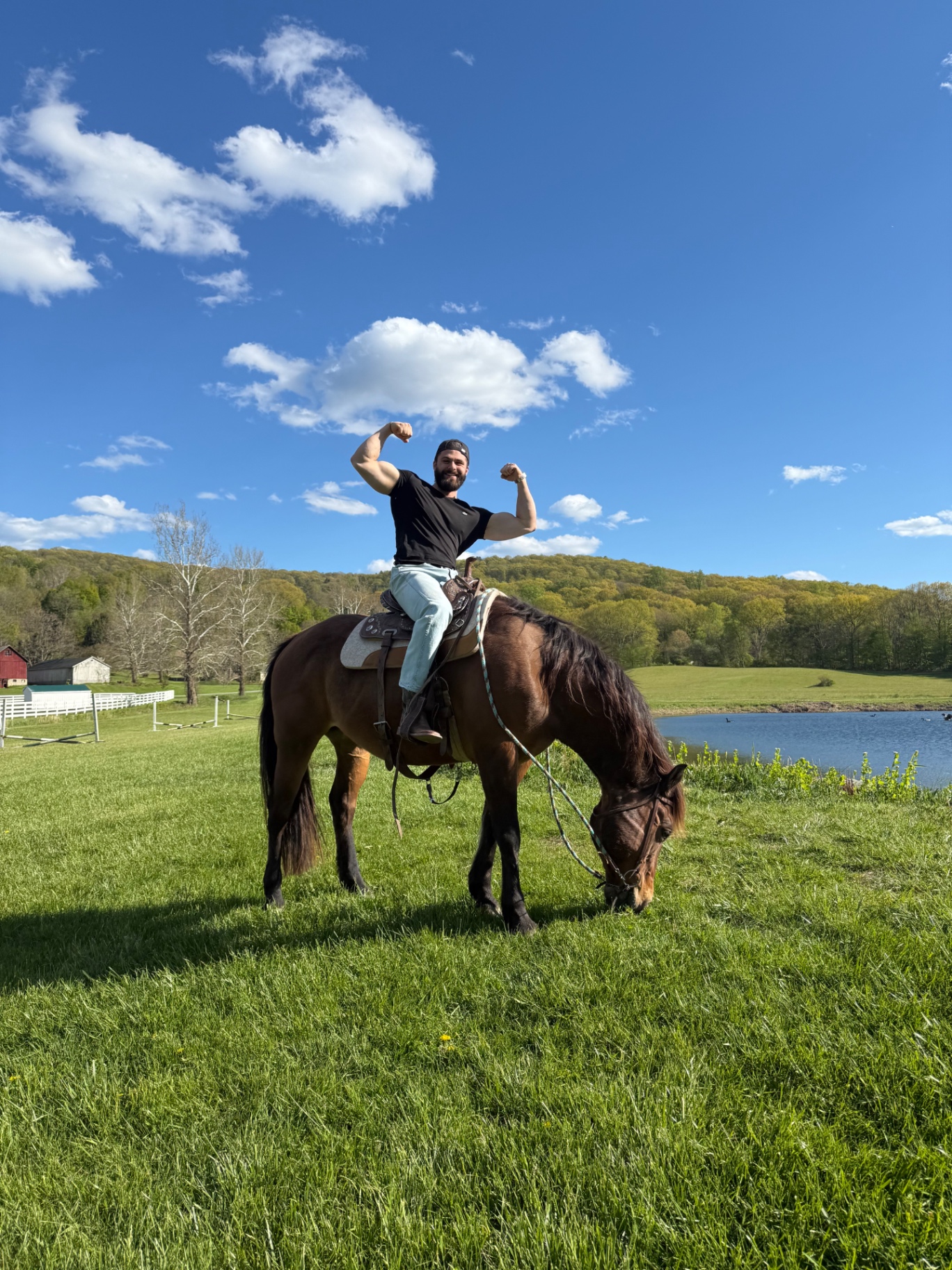Rider on horseback by the lake